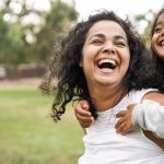 mum and daughter laughing